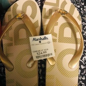 Silver and white womans michael kors flip flops size 7 brand new with tags